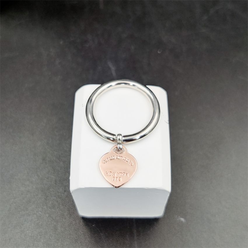 rose gold tag pendant rings