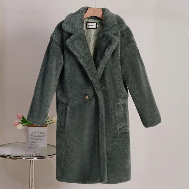 green teddy coat