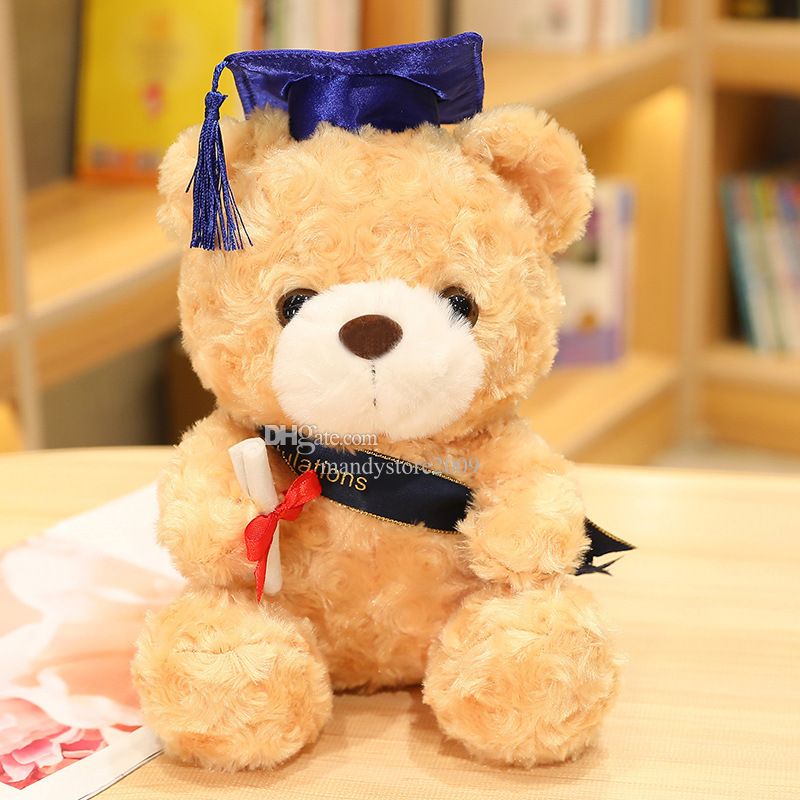 light teddy with blue hat