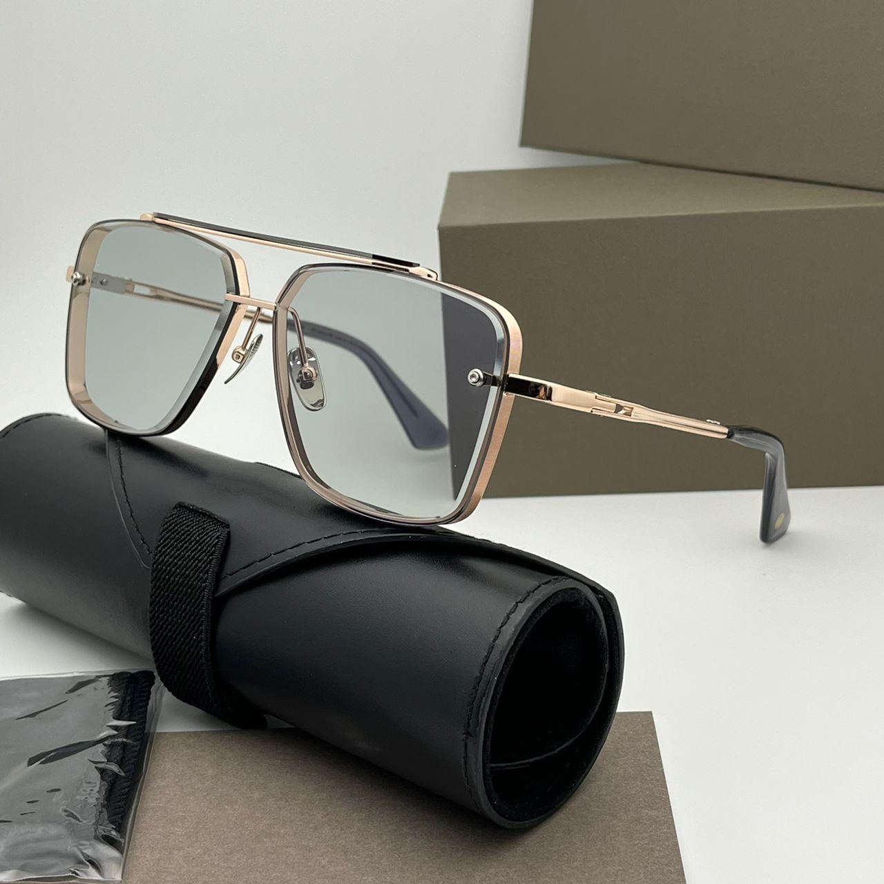 Rosegold Frame Light Grey Lens