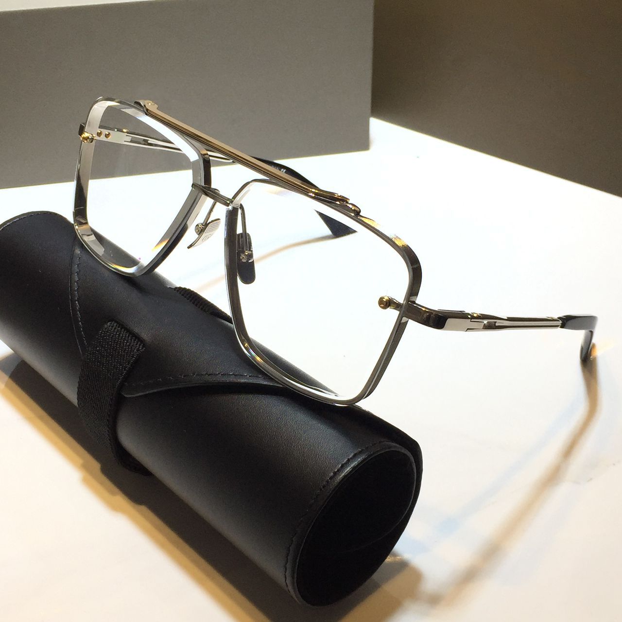 silver frame clear lens