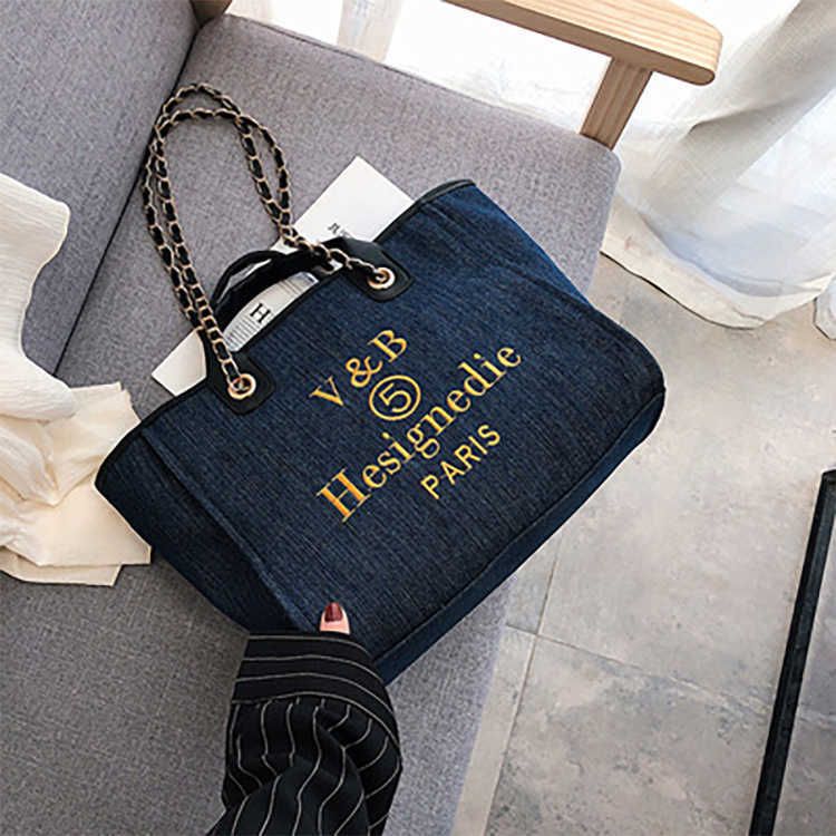 navy blue hand bags