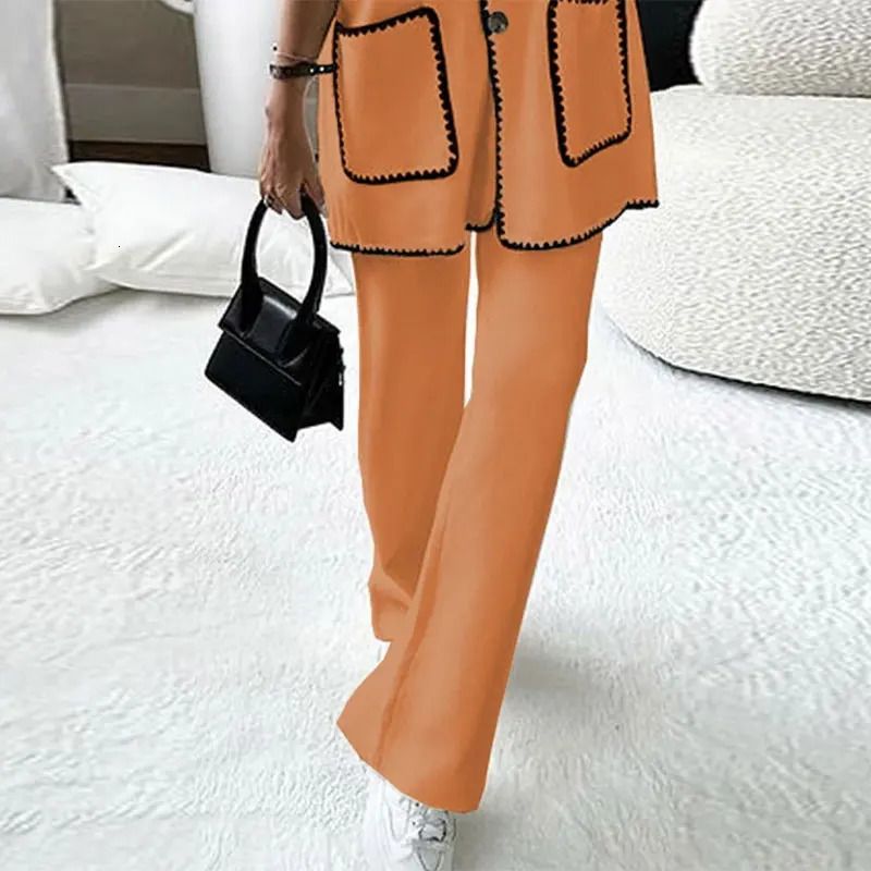 апельсиновые брюки