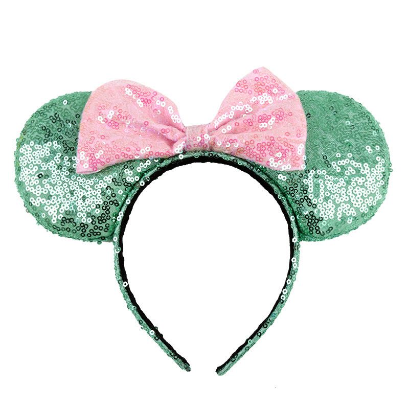green and pink bow