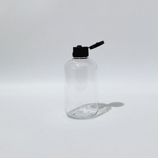 Plastique noir de 100 ml de bouteille transparente