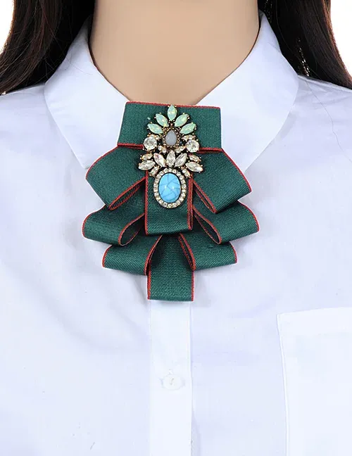 deep green brooch