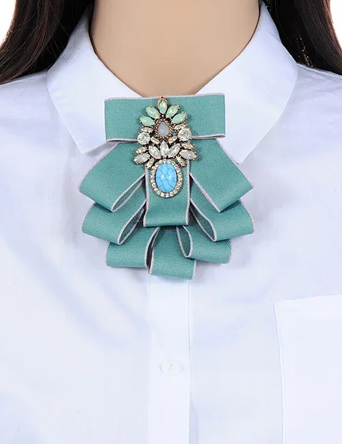 light green brooch