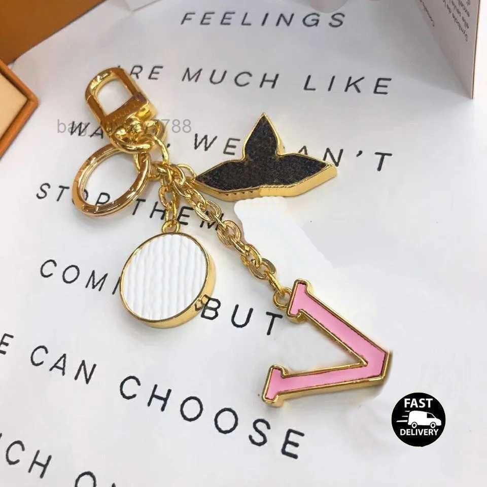 Handmade Gold Small Keychain With Classic Brand Letter Design Luxury  Designer Fashion Accessory For Men And Women From Bag_luxury7788, $21.61