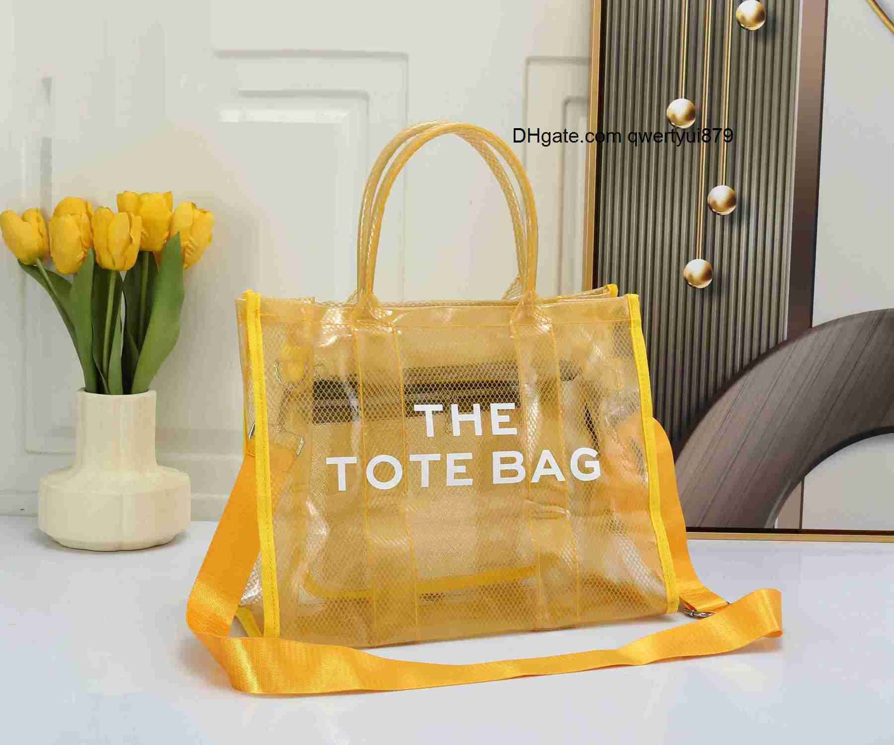 Designer Totes Clear PVC Large Branded The Tote Bag Designer Mesh Shoulder  Purses Transparent Women Jelly Hand Bag Casual Beach Shopping Tote From  Qwertyui879, $23.87