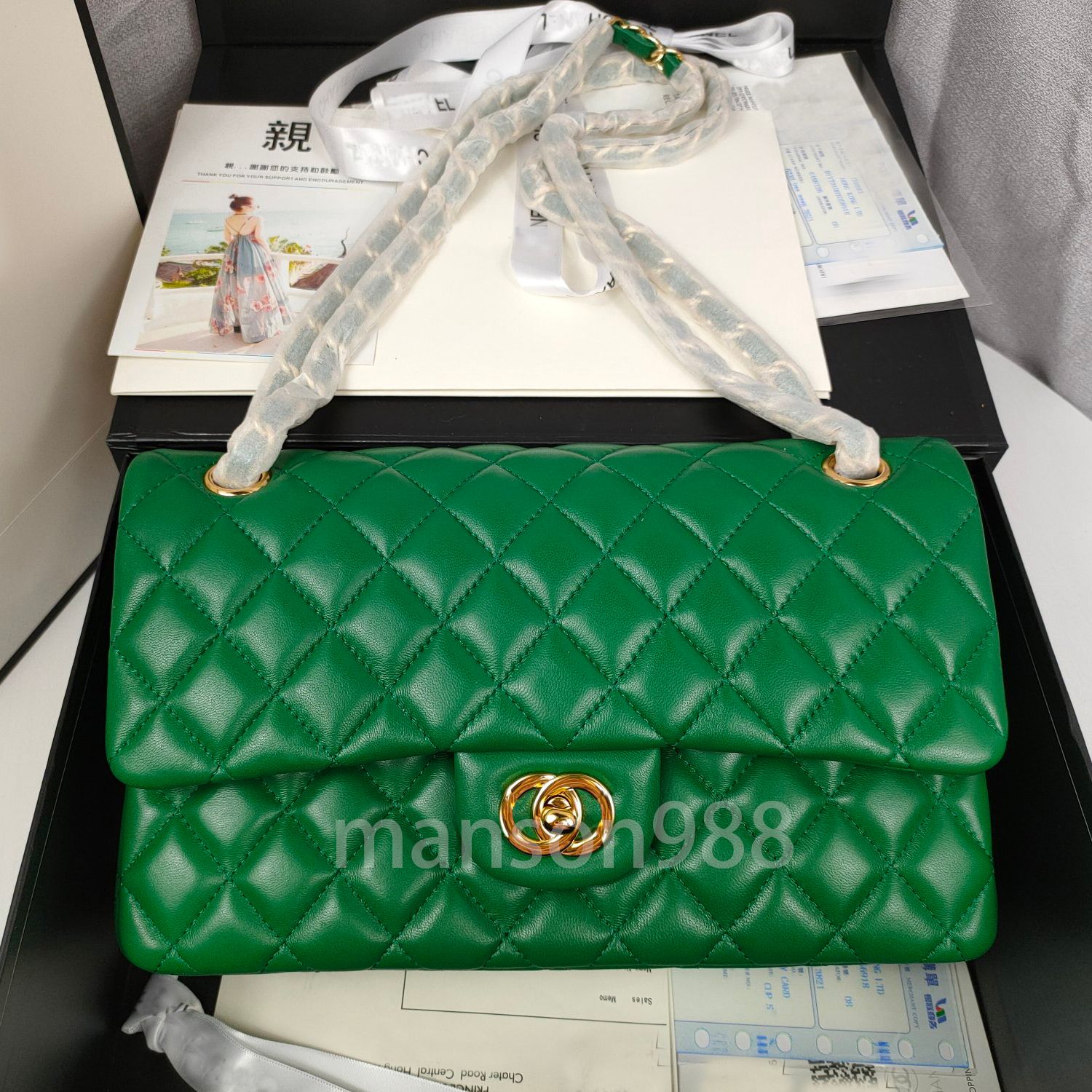 green bag with gold buckle