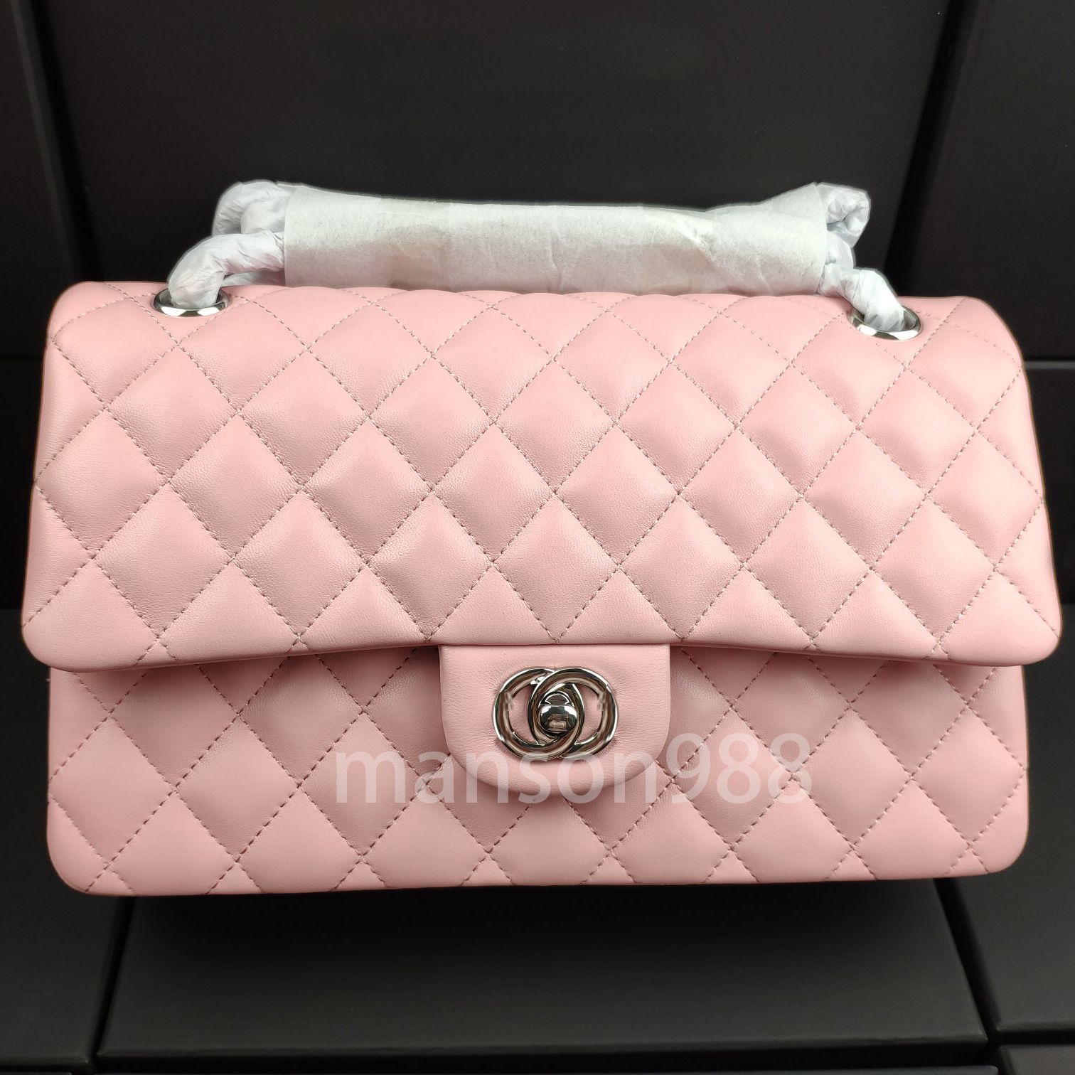 pink bag with silver buckle