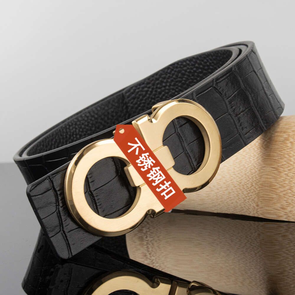 a gold buckle black strap with