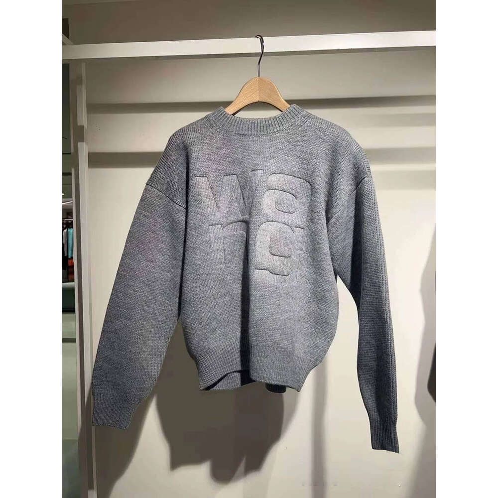 Nuovo maglione grigio Da Wang