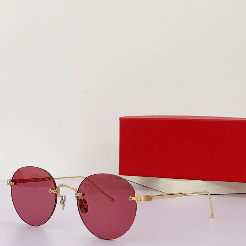 Gold frame and pink lenses