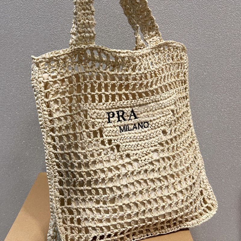 Shop PRADA Prada Triangle crochet shoulder bag Black by Caterina