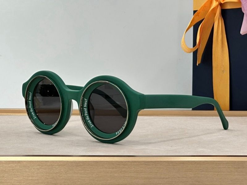 Green frame grey lens