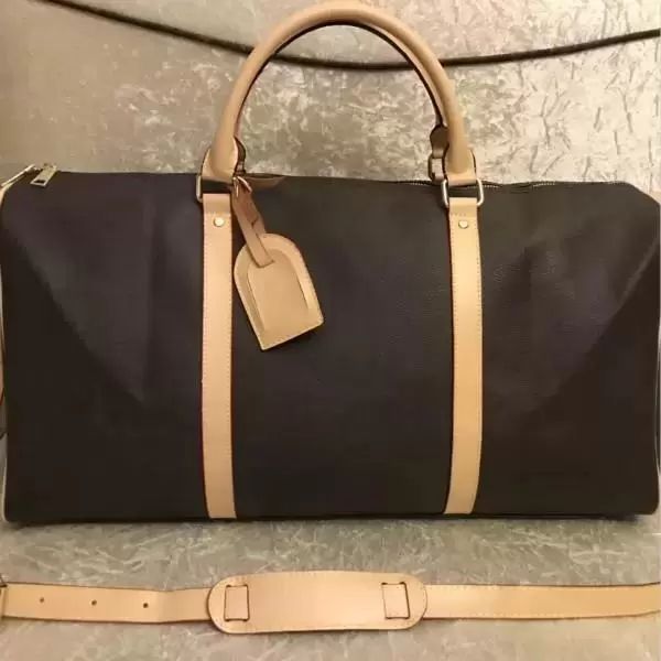 Luxurys Designer Bag Men Women 55cm Large Travel Luggage BagS Key And Lock  Mens Totes Leather Handbag Duffle Bag Courrier Shoulder287Z From Cq0303,  $36.55