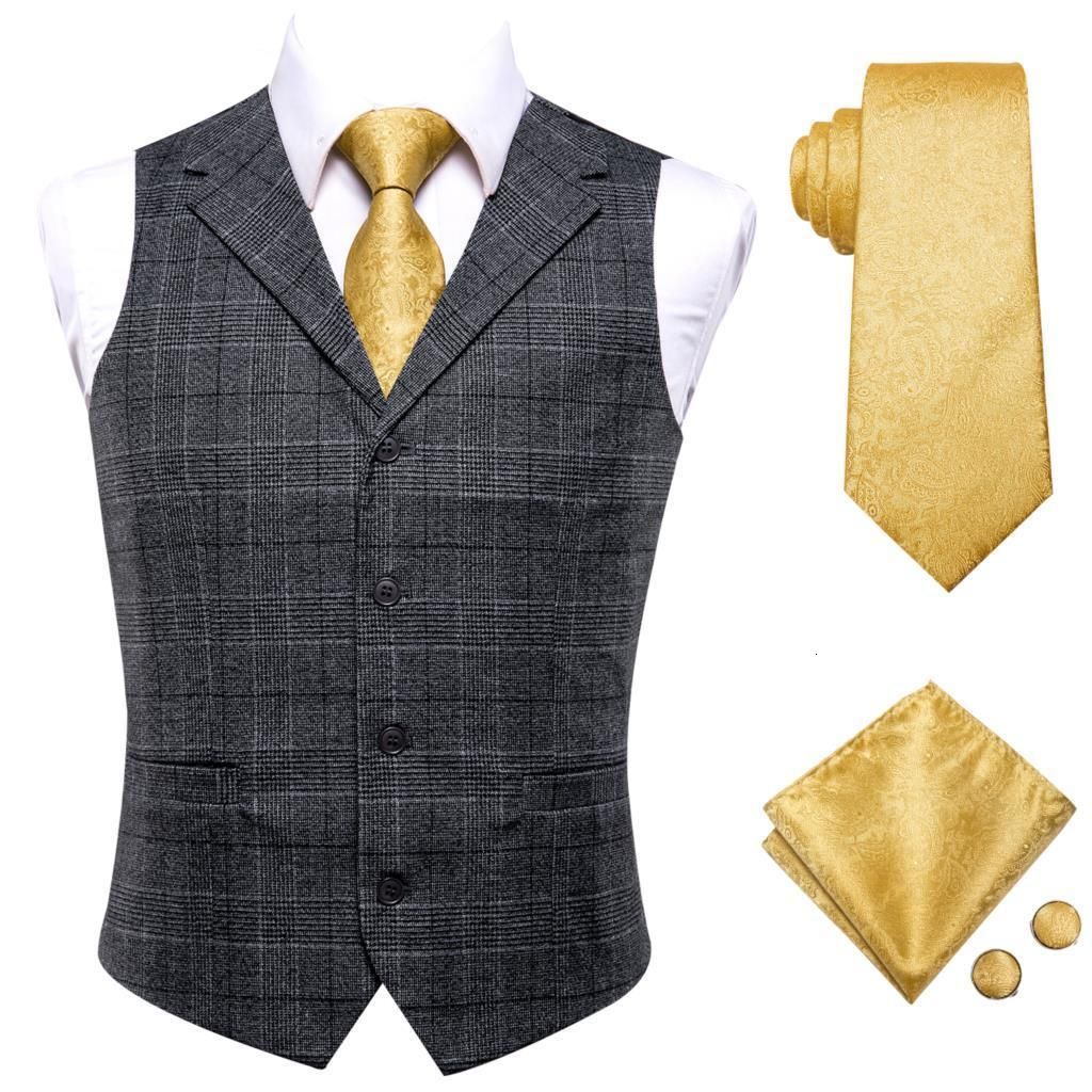 vest with gold tie