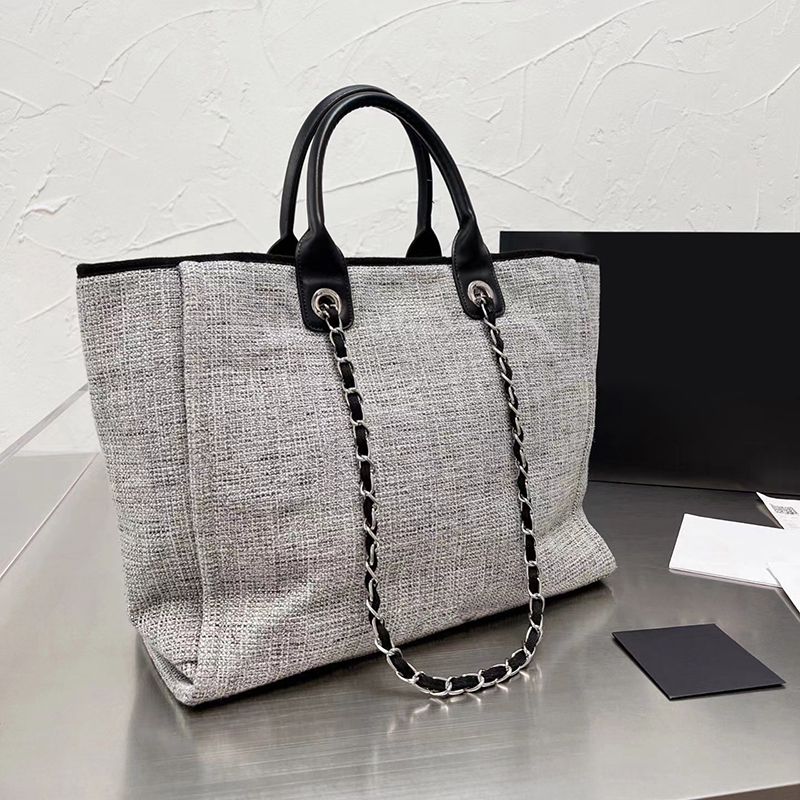 Sac gris foncé + poussière