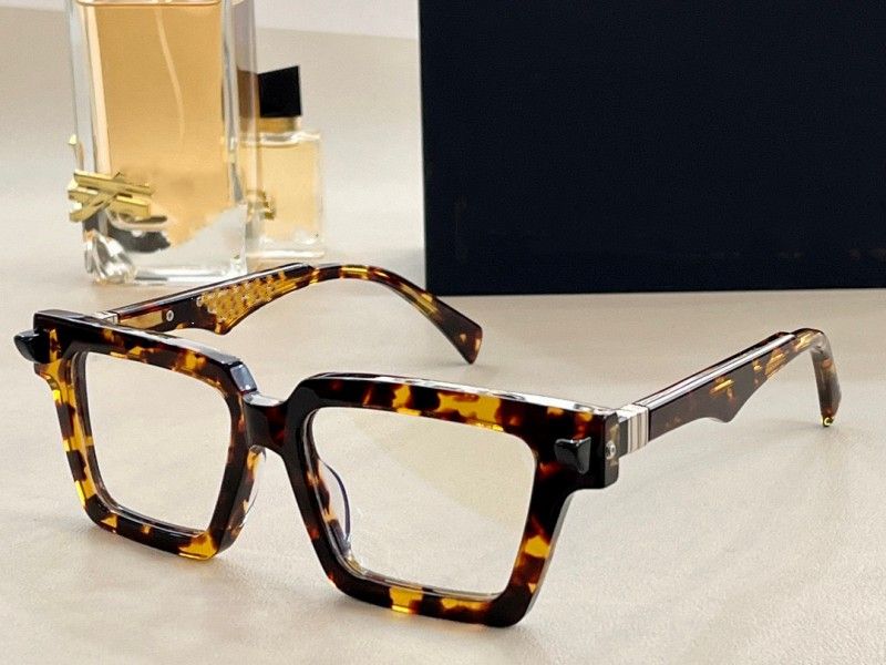 Amber Frame Clear Lens