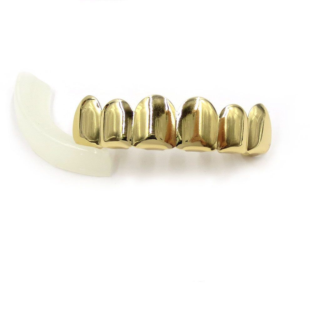 Dentes superiores planos de ouro
