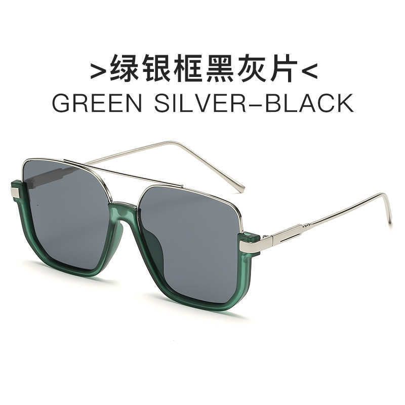 groen zilveren frame en zwart grijze plak