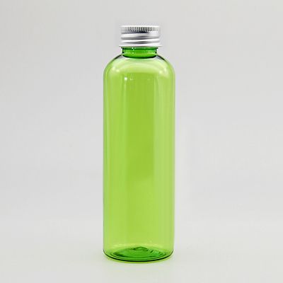 Zielona butelka srebrna plastik