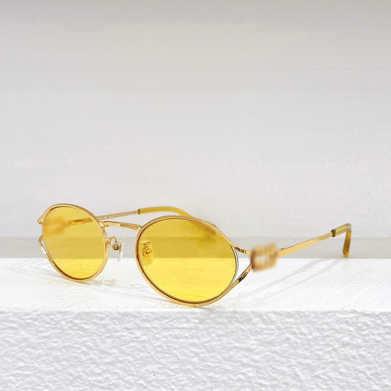 gold frame yellow lens