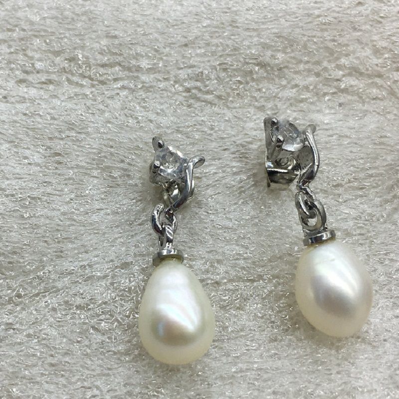 white pearl earrings