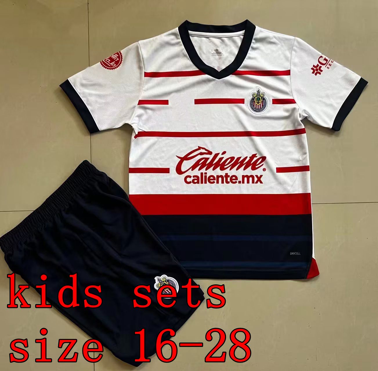 away kids sets 23/24