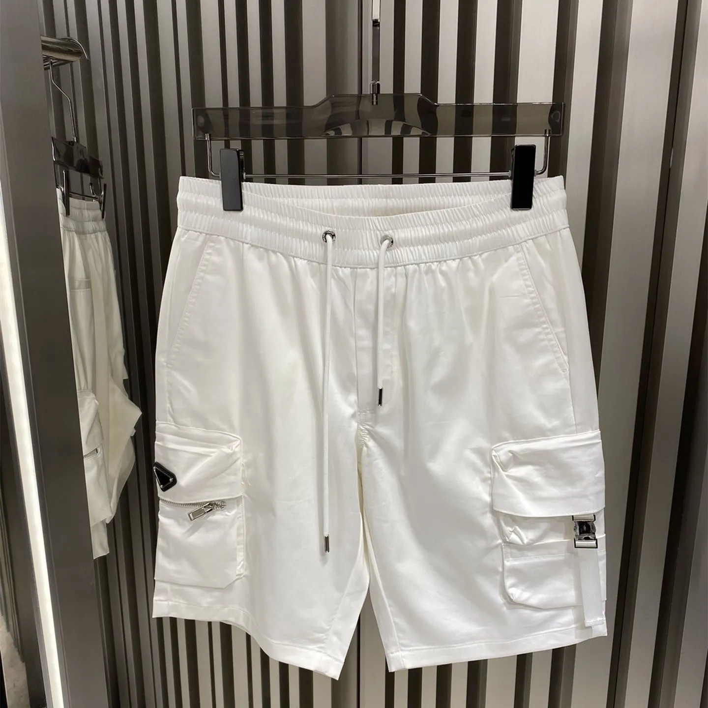 pantalones cortos de nailon blanco