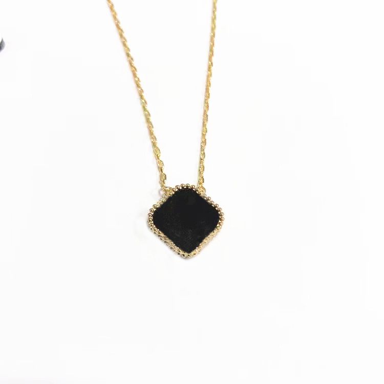 Gold and black agate necklace