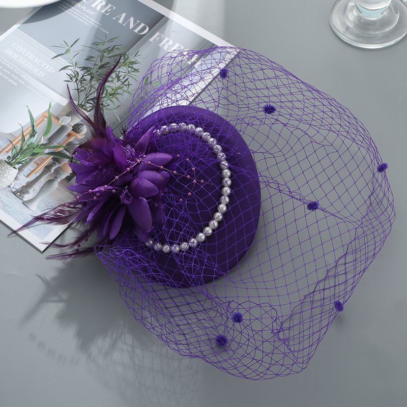 Cappello di perle viola