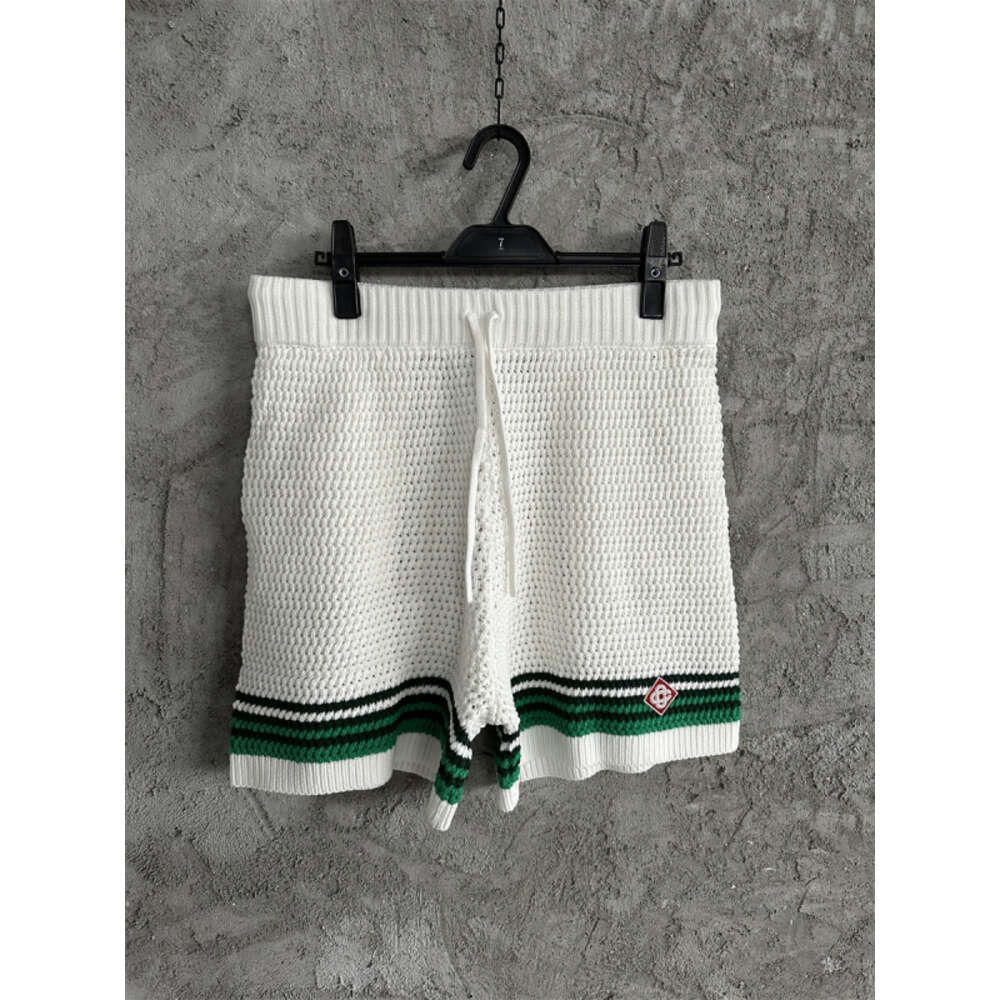 shorts branco e verde