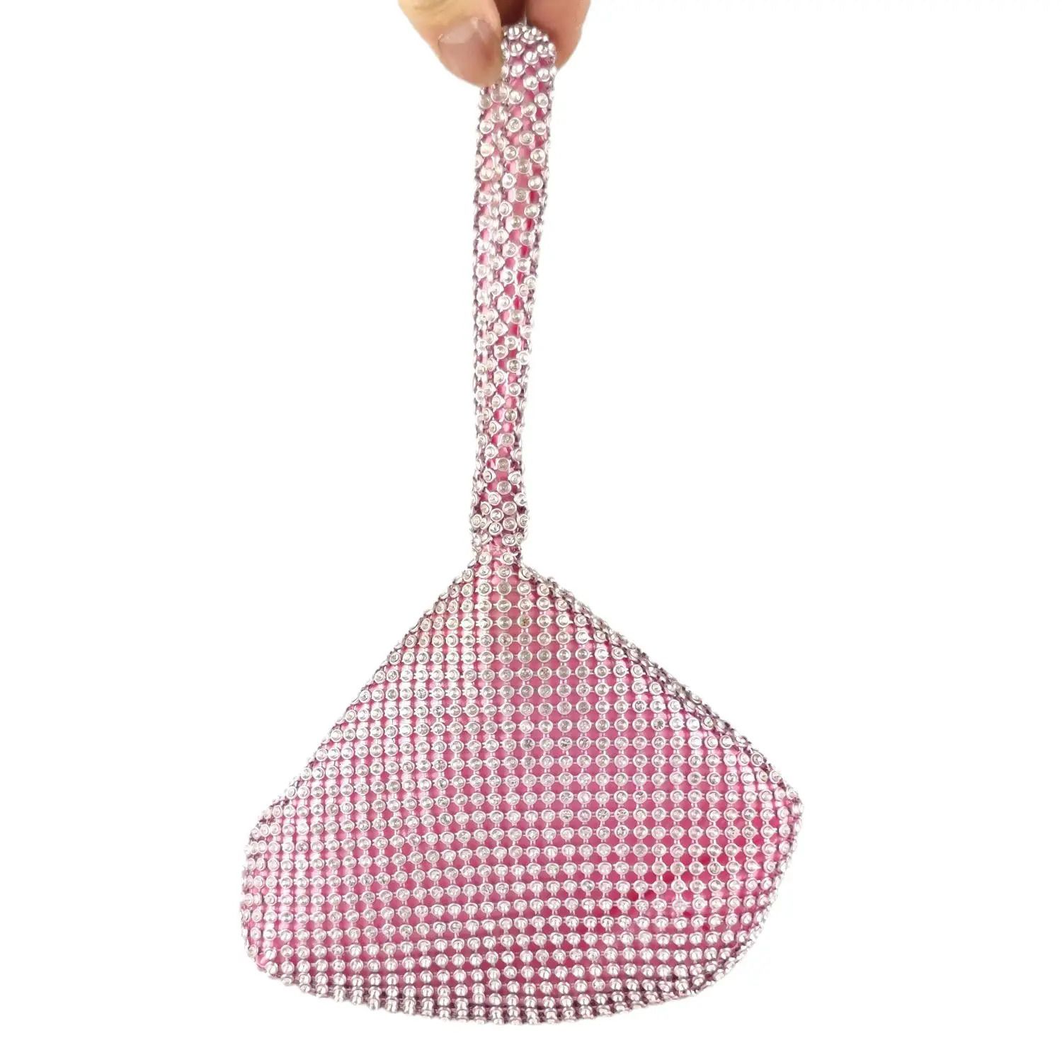 bolso de cristal rosa