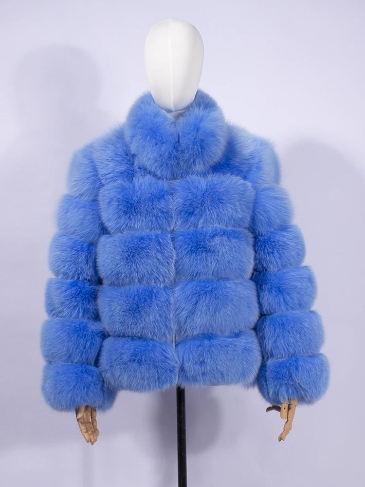 abrigo de piel azul bebé