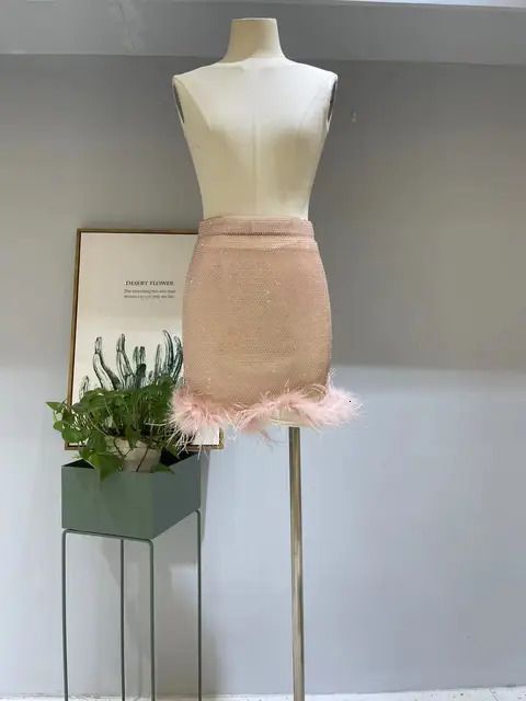 pluma de falda rosa