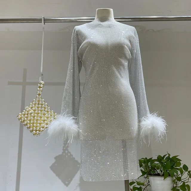 vestido de la pluma blanca