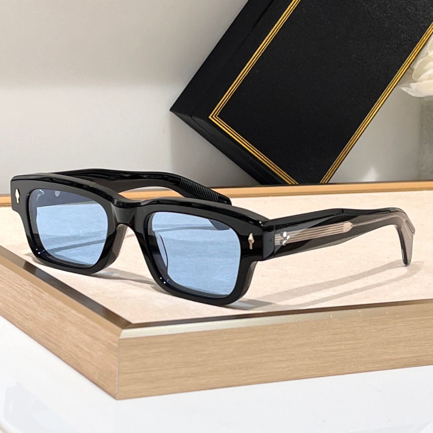 black frame blue lens