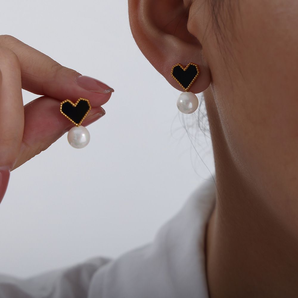 Boucles d'oreilles perles acryliques noires dorées