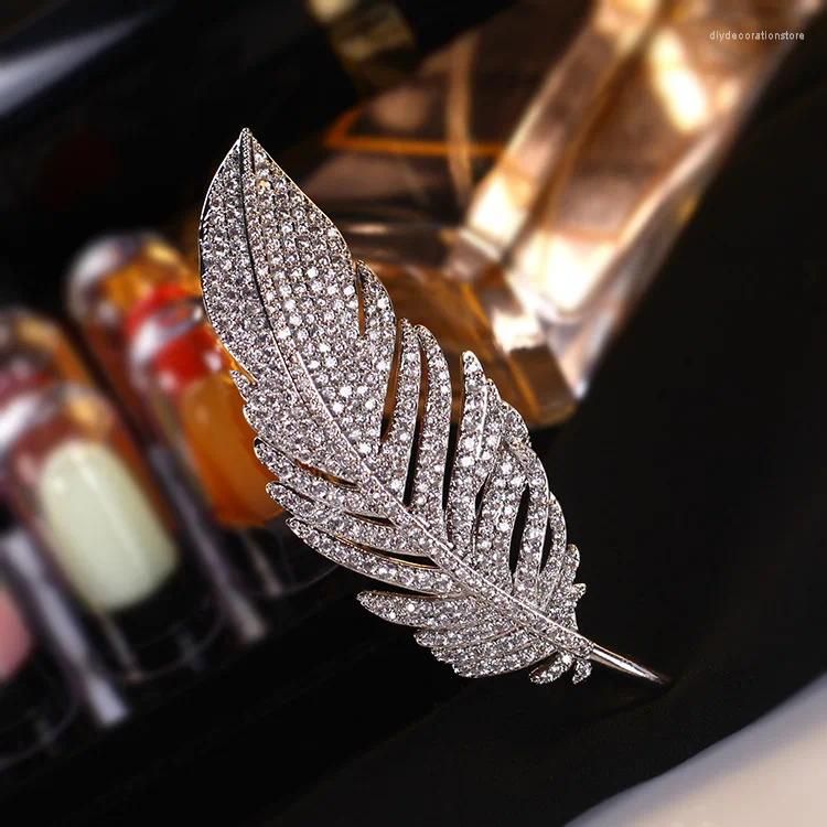 Brooches Luxury Female Crystal Feather Brooch Dainty Silver Color Jewelry  For Women Cute Zircon Stone Pin Dress Coat Accessory From  Diydecorationstore, $6.94