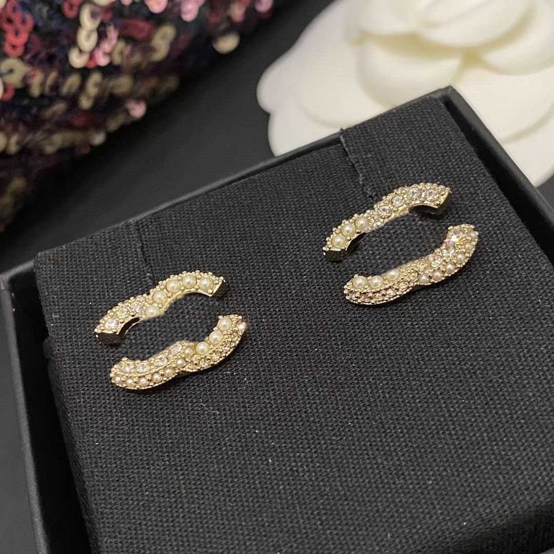 003 boucle d'oreille + boîte