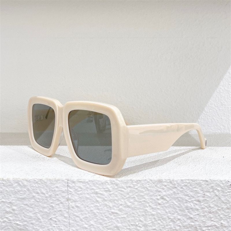 Beige witte frame grijze lens