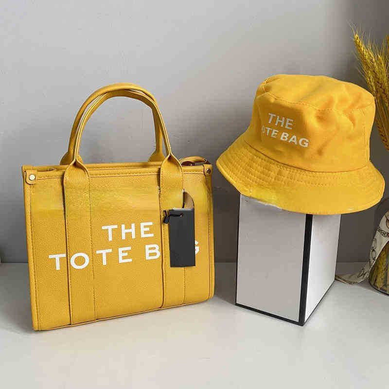 abito giallo: borsa + cappello