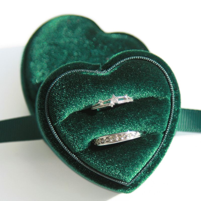 green double ring box with ribbon