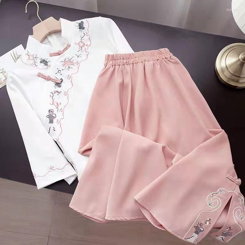 white top pink skirt