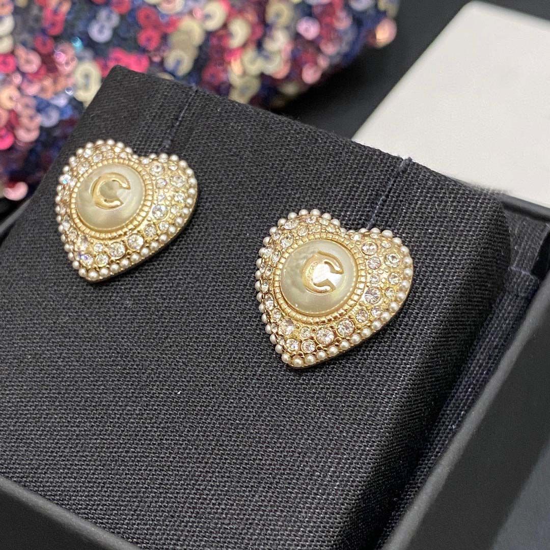 003 boucle d'oreille + boîte