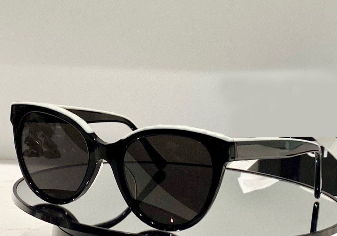 chanel butterfly sunglasses black and beige