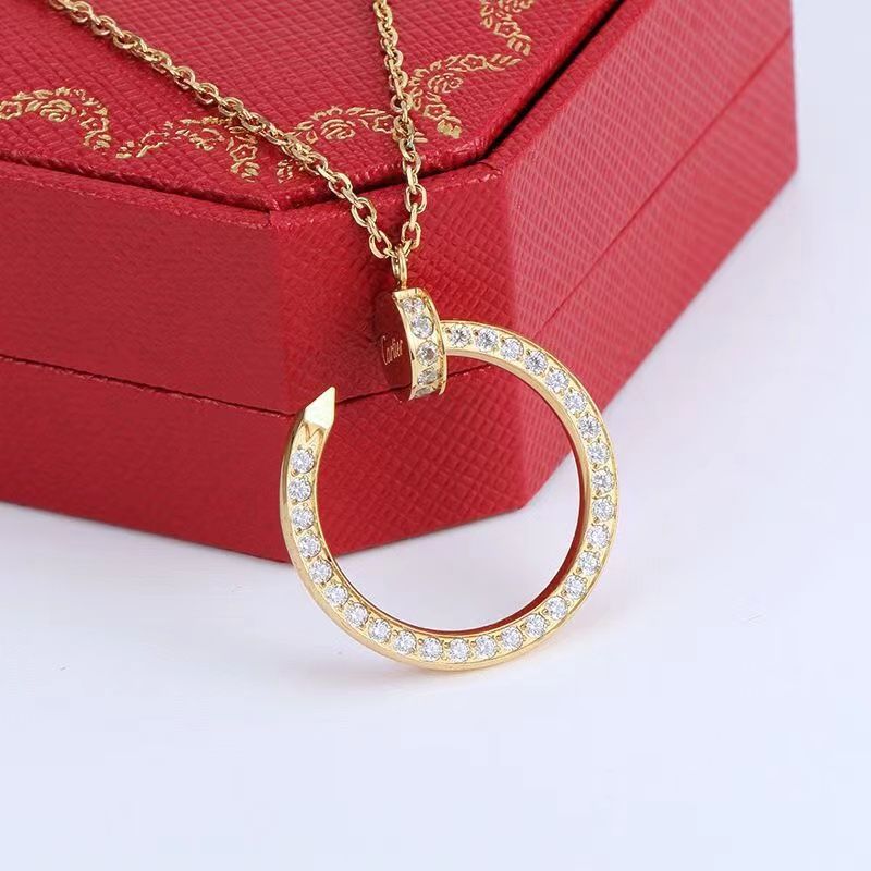Gold nail necklace with cz