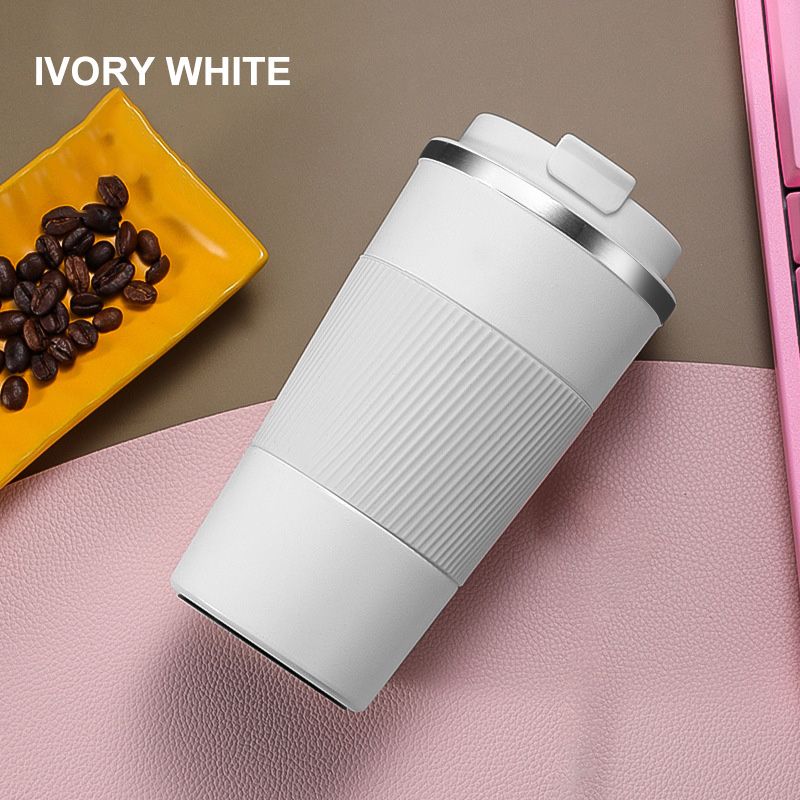 white thermos cup